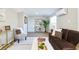 This cozy living room featuring modern decor, comfortable seating, and an eye-catching bookshelf at 3502 N Lincoln Ave, Tampa, FL 33607