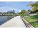 The property features a private boat dock with lift system, offering direct waterfront access at 376 Portofino Dr, Punta Gorda, FL 33950
