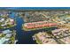 Beautiful aerial view of waterfront community with canals and access to open water at 3800 Bal Harbor Blvd # 415, Punta Gorda, FL 33950