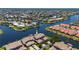Breathtaking aerial view of waterfront homes with canals, boat docks and well-manicured landscaping at 3800 Bal Harbor Blvd # 415, Punta Gorda, FL 33950