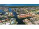 An impressive aerial view showcases a waterfront community with canals and easy access to the open ocean at 3800 Bal Harbor Blvd # 415, Punta Gorda, FL 33950