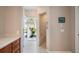 Bathroom with tile shower and access to private outdoor courtyard at 3800 Bal Harbor Blvd # 415, Punta Gorda, FL 33950
