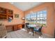 Bright breakfast nook with waterfront view, glass table, and comfortable seating at 3800 Bal Harbor Blvd # 415, Punta Gorda, FL 33950