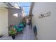 Enclosed courtyard with tiled floors, comfortable seating, and decorative plants, offers a private and tranquil outdoor space at 3800 Bal Harbor Blvd # 415, Punta Gorda, FL 33950