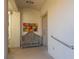 Charming home entrance with bench seating, decorative wall art, and a welcoming front door, creates a warm and inviting ambiance at 3800 Bal Harbor Blvd # 415, Punta Gorda, FL 33950