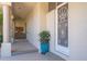 Charming front porch enhanced by decorative details and lush greenery, creating a welcoming entrance at 3800 Bal Harbor Blvd # 415, Punta Gorda, FL 33950