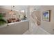 Open-concept living area with staircase and tile flooring at 3800 Bal Harbor Blvd # 415, Punta Gorda, FL 33950