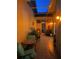 Enclosed porch featuring neutral tile, an outdoor dining set, and a comfortable seating area at 3800 Bal Harbor Blvd # 415, Punta Gorda, FL 33950