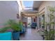 Serene patio adorned with potted plants, comfortable seating and tiled flooring at 3800 Bal Harbor Blvd # 415, Punta Gorda, FL 33950