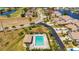 Aerial shot of private pool, pool house, and nice landscaping at 3800 Bal Harbor Blvd # 415, Punta Gorda, FL 33950