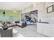 Spacious sunroom with tiled floors and a seamless transition to the home's interior at 3800 Bal Harbor Blvd # 415, Punta Gorda, FL 33950