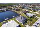 Scenic aerial view of a waterfront property featuring boat docks and a well-maintained neighborhood at 3907 San Pietro Ct, Punta Gorda, FL 33950