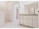 Bright bathroom featuring neutral colors, storage vanity, and tiled flooring at 3907 San Pietro Ct, Punta Gorda, FL 33950