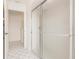 Bathroom featuring neutral colors, walk-in shower with glass doors and a bright, clean aesthetic at 3907 San Pietro Ct, Punta Gorda, FL 33950