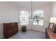 Bright bedroom with large windows, neutral decor, and ample natural light at 3907 San Pietro Ct, Punta Gorda, FL 33950