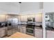 Well-equipped kitchen with stainless steel appliances and ample cabinet space at 3907 San Pietro Ct, Punta Gorda, FL 33950