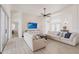 Spacious living room with modern decor, featuring an open floor plan and ample seating at 3907 San Pietro Ct, Punta Gorda, FL 33950