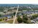 Aerial view of a canal community homes with waterfront access and mature trees at 4009 Yucatan Cir, Port Charlotte, FL 33948