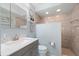 A charming bathroom featuring a modern vanity, updated fixtures, and a stylish walk-in shower at 4009 Yucatan Cir, Port Charlotte, FL 33948