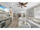 Bright living room offering an open layout, comfortable seating, and seamless flow to other living areas at 4009 Yucatan Cir, Port Charlotte, FL 33948