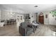 Spacious living room with dining area, comfortable seating, and an open floor plan to the kitchen at 4009 Yucatan Cir, Port Charlotte, FL 33948
