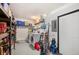 Spacious storage room complete with laundry area, shelving, and ample storage space at 4009 Yucatan Cir, Port Charlotte, FL 33948