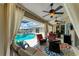 A spacious covered patio featuring comfortable seating and outdoor views at 5010 La Costa Island Ct, Punta Gorda, FL 33950