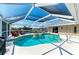 Enclosed pool and jacuzzi area features ample space for relaxing and entertaining at 5010 La Costa Island Ct, Punta Gorda, FL 33950