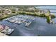A scenic view of the marina with multiple boats docked, close to waterfront property at 5301 Linksman Pl, North Port, FL 34287