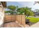 Private patio with brick pavers, and a view of green space at 5301 Linksman Pl, North Port, FL 34287