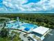 Aerial view of the community water park with pools and slides at 5301 Linksman Pl, North Port, FL 34287