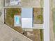 Aerial view of the house, including the pool and the surrounding yard at 5527 Fairway S Dr, Punta Gorda, FL 33982