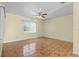 Bedroom featuring decorative tile flooring and natural light from the window at 5527 Fairway S Dr, Punta Gorda, FL 33982