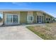 The side exterior of a single Gathering home in Florida at 5527 Fairway S Dr, Punta Gorda, FL 33982