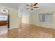 Bright open space featuring tile flooring and a glimpse of the kitchen at 5527 Fairway S Dr, Punta Gorda, FL 33982