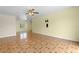 Spacious living room featuring decorative tile flooring and neutral paint at 5527 Fairway S Dr, Punta Gorda, FL 33982