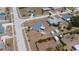 Aerial view of home, back yard and community including multiple storage sheds at 6336 Drucker Cir, Port Charlotte, FL 33981