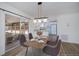 Dining room view showing table for six and sliding door to sunroom at 6336 Drucker Cir, Port Charlotte, FL 33981