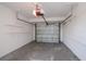 Spacious garage featuring an automatic door and ample storage or parking space at 6336 Drucker Cir, Port Charlotte, FL 33981