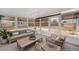 Inviting sunroom with a comfortable seating area and natural light at 6336 Drucker Cir, Port Charlotte, FL 33981