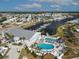 Aerial view of community, featuring a marina, swimming pool, clubhouse, and recreational areas at 643 Blackburn Blvd, North Port, FL 34287