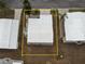 Aerial view of home featuring roof, yard, and exterior at 713 Riverview Cir, North Port, FL 34287