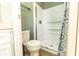 Well-maintained bathroom featuring a shower, toilet, and classic fixtures for comfort and convenience at 713 Riverview Cir, North Port, FL 34287