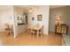 Dining room features a buffet, ceiling fan and table with seating for four at 713 Riverview Cir, North Port, FL 34287