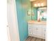 Charming main bathroom with bright vanity, mirror, and fixtures, creates a refreshing atmosphere at 713 Riverview Cir, North Port, FL 34287