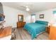 Bright main bedroom offers a peaceful retreat, complete with desk and natural light at 713 Riverview Cir, North Port, FL 34287