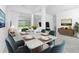 Dining room featuring a marble table and seating for six at 8488 Saint Kitts Cir, Englewood, FL 34224