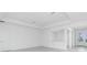 Living room featuring a large window and recessed lighting at 8488 Saint Kitts Cir, Englewood, FL 34224