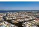 Panoramic aerial view of a waterfront community with canals, bridges, and a clear blue sky on a sunny day at 910 Via Tripoli, Punta Gorda, FL 33950