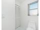 Neutral half-bathroom with toilet, window, and closet at 910 Via Tripoli, Punta Gorda, FL 33950